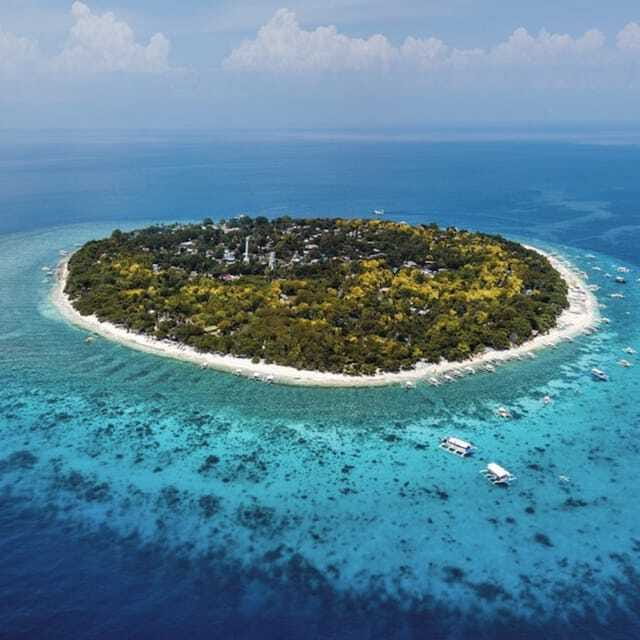 Panglao:Balicasag Island Tour with Turtle & Dolphin Watching - Balicasag Island and the change to smaller boats