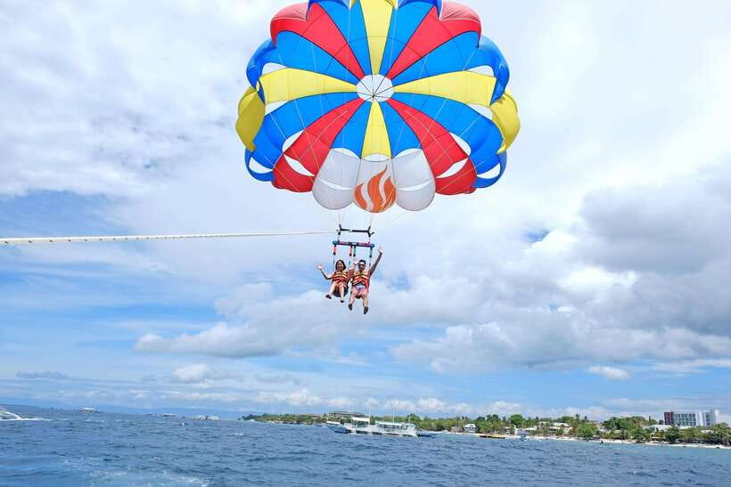 Panglao: Solo or Tandem Parasailing Experience near Alona - Getting ready with a life jacket and harness