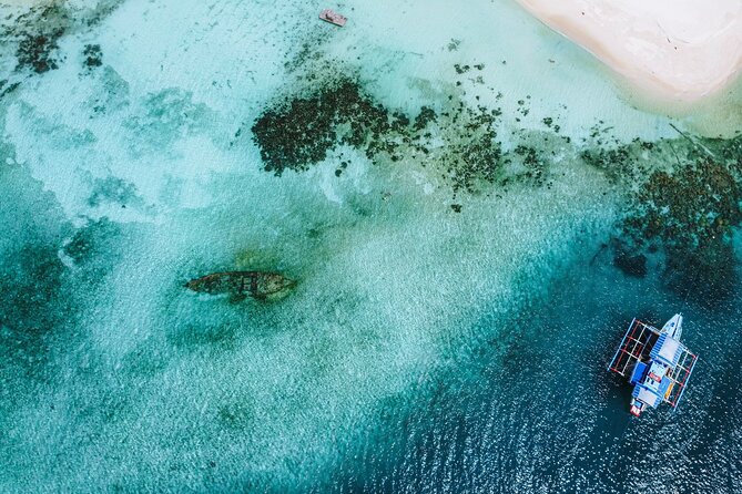 Private Linapacan Island Day Trip with Buffet Lunch - Maosanon Island, your first long beach stop