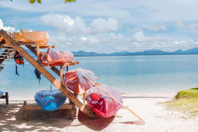 Puerto Princesa: Cowrie Island Guided Day Tour with Meal - Cowrie Island’s white sand and coconut trees