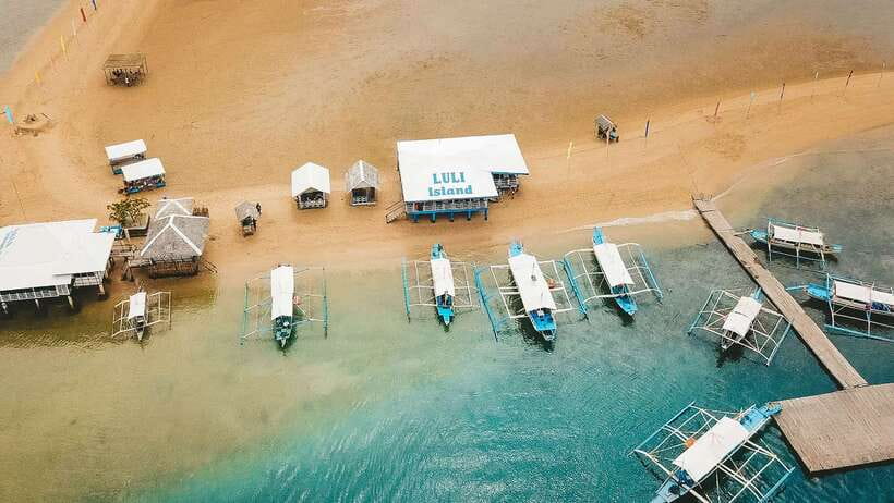 Puerto Princesa: Honda Bay Island Hopping & Optional Massage - Cowrie Island, lunch, and the longest beach break