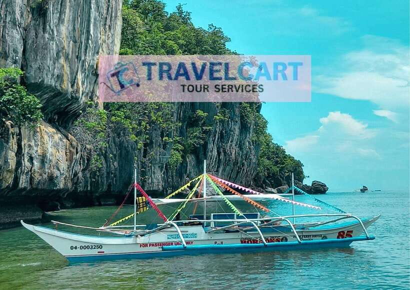 Puerto Princesa Underground River Tour with Zipline - Crossing emerald water to the cave entrance