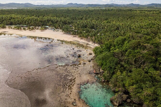 Siargao Private Inland Tour with Sugba Lagoon and Lunch - Magpupungko Rock Pools and the pull of the tide