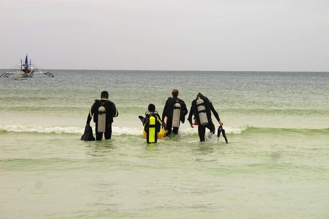 WaterColors Discover Scuba in Boracay (Shore Dive Only) - Entering the shallow water beside the shop